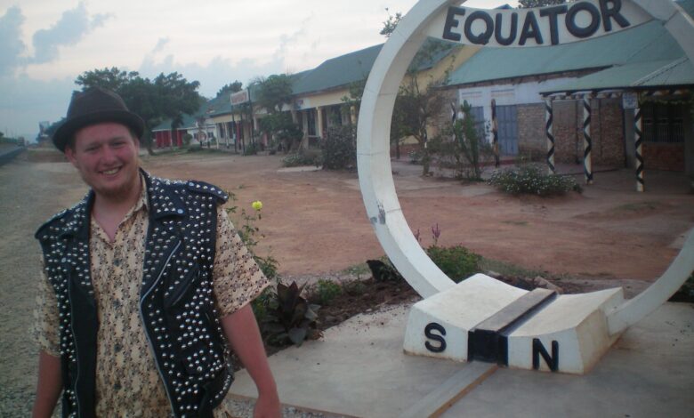 Queer punk in Uganda: The author in Uganda in front of a pub